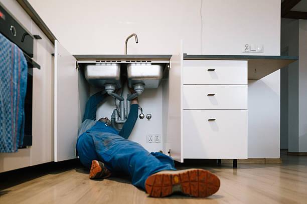 Professional Drain Cleaning technician working in Sorrento, FL